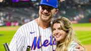 July 12, 2021; Denver, CO, USA; New York Mets first baseman Pete Alonso poses for photographs with wife Haley Walsh and the winners trophy following his victory in the 2021 MLB Home Run Derby.
