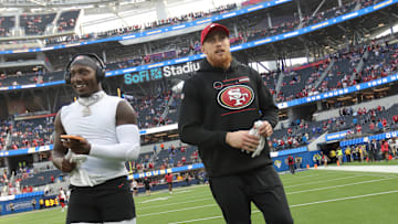 San Francisco 49ers wide receiver Deebo Samuel (L) and tight end George Kittle (R)