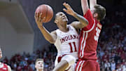 Indiana Hoosiers guard Devonte Green (11) shoots the ball while Wisconsin Badgers forward Nate Reuvers (35) defends in the first half at Simon Skjodt Assembly Hall.