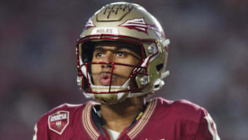 Nov 18, 2023; Tallahassee, Florida, USA; Florida State Seminoles quarterback Jordan Travis (13) during the warm ups against the North Alabama Lions at Doak S. Campbell Stadium. Mandatory Credit: Morgan Tencza-Imagn Images