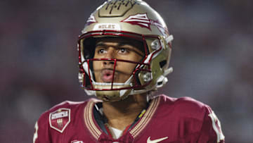 Nov 18, 2023; Tallahassee, Florida, USA; Florida State Seminoles quarterback Jordan Travis (13) during the warm ups against the North Alabama Lions at Doak S. Campbell Stadium. Mandatory Credit: Morgan Tencza-Imagn Images