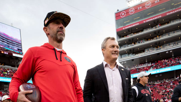 San Francisco 49ers head coach Kyle Shanahan (L) and general manager John Lynch (R)