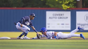 Johnson's Kayson Cunningham fields a ball in the UIL 6A Region 4 baseball final on June 1, 2023.