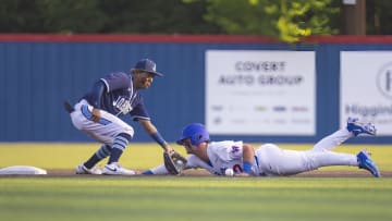 Johnson's Kayson Cunningham fields a ball in the UIL 6A Region 4 baseball final on June 1, 2023.