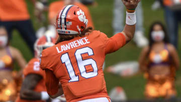 Clemson quarterback Trevor Lawrence(16) throws a touchdown pass to wide receiver Frank Ladson Jr.(2) during the first quarter of the game Saturday, Sept. 19, 2020 at Memorial Stadium in Clemson, S.C