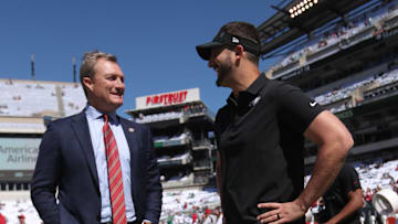 San Francisco 49ers general manager John Lynch (L) and Philadelphia Eagles head coach Nick Sirianni (R)