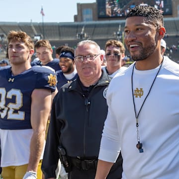 Apr 12, 2025; Notre Dame, IN, USA; Notre Dame Fighting Irish head coach Marcus Freeman smiles as he walks off the field after the Blue-Gold game at Notre Dame Stadium. 