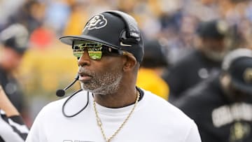Nov 8, 2025; Morgantown, West Virginia, USA; Colorado Buffaloes head coach Deion Sanders walks along the sidelines late in the fourth quarter against the West Virginia Mountaineers at Milan Puskar Stadium. Mandatory Credit: Ben Queen-Imagn Images