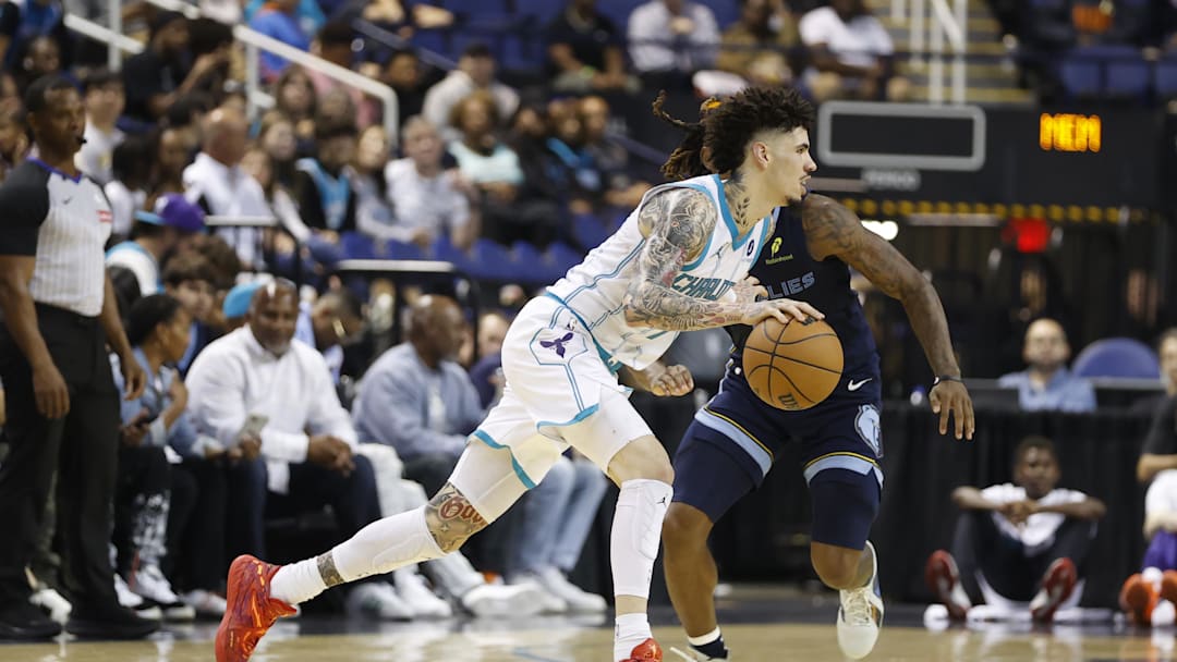 Oct 15, 2025; Greensboro, North Carolina, USA; Charlotte Hornets guard LaMelo Ball (1) dribbles the ball during the second half against the Memphis Grizzlies at First Horizon Coliseum. Mandatory Credit: Brian Westerholt-Imagn Images