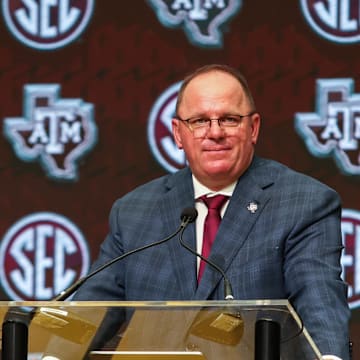 Jul 17, 2025; Atlanta, GA, USA; Texas A&M Aggies head coach Mike Elko talks to the media during the SEC Media Days at Omni Atlanta Hotel. Mandatory Credit: Jordan Godfree-Imagn Images