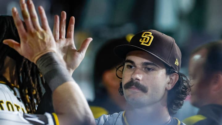 Sep 13, 2025; San Diego, California, USA; San Diego Padres starting pitcher Dylan Cease (84) celebrates in the dugout after coming off the field during the sixth inning against the Colorado Rockies at Petco Park. Mandatory Credit: David Frerker-Imagn Images Sep 13, 2025; San Diego, California, USA; San Diego Padres starting pitcher Dylan Cease (84) celebrates in the dugout after coming off the field during the sixth inning against the Colorado Rockies at Petco Park. Mandatory Credit: David Frerker-Imagn Images