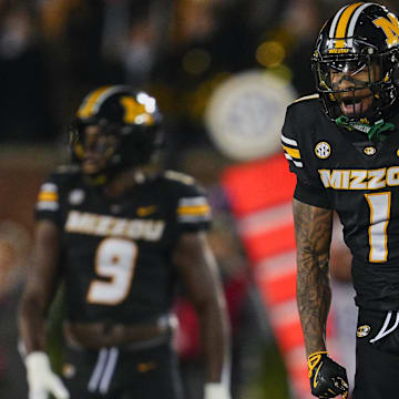 Nov 9, 2024; Columbia, Missouri, USA; Missouri Tigers safety Marvin Burks Jr. (1) celebrates after a fumble recovery during the second half against the Oklahoma Sooners at Faurot Field at Memorial Stadium. Mandatory Credit: Jay Biggerstaff-Imagn Images
