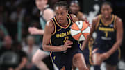 Jul 22, 2025; Brooklyn, New York, USA;  Indiana Fever guard Kelsey Mitchell (0) brings the ball up court in the third quarter against the New York Liberty at Barclays Center. Mandatory Credit: Wendell Cruz-Imagn Images