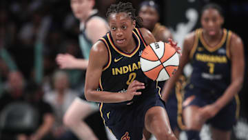 Jul 22, 2025; Brooklyn, New York, USA;  Indiana Fever guard Kelsey Mitchell (0) brings the ball up court in the third quarter against the New York Liberty at Barclays Center. Mandatory Credit: Wendell Cruz-Imagn Images