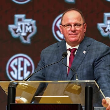 Jul 17, 2025; Atlanta, GA, USA; Texas A&M Aggies head coach Mike Elko talks to the media during the SEC Media Days at Omni Atlanta Hotel. Mandatory Credit: Jordan Godfree-Imagn Images