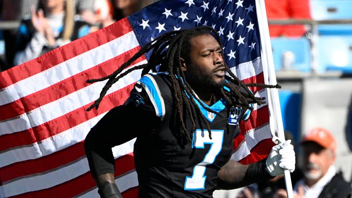 Carolina Panthers linebacker Jadeveon Clowney runs on to the field before the game at Bank of America Stadium. 