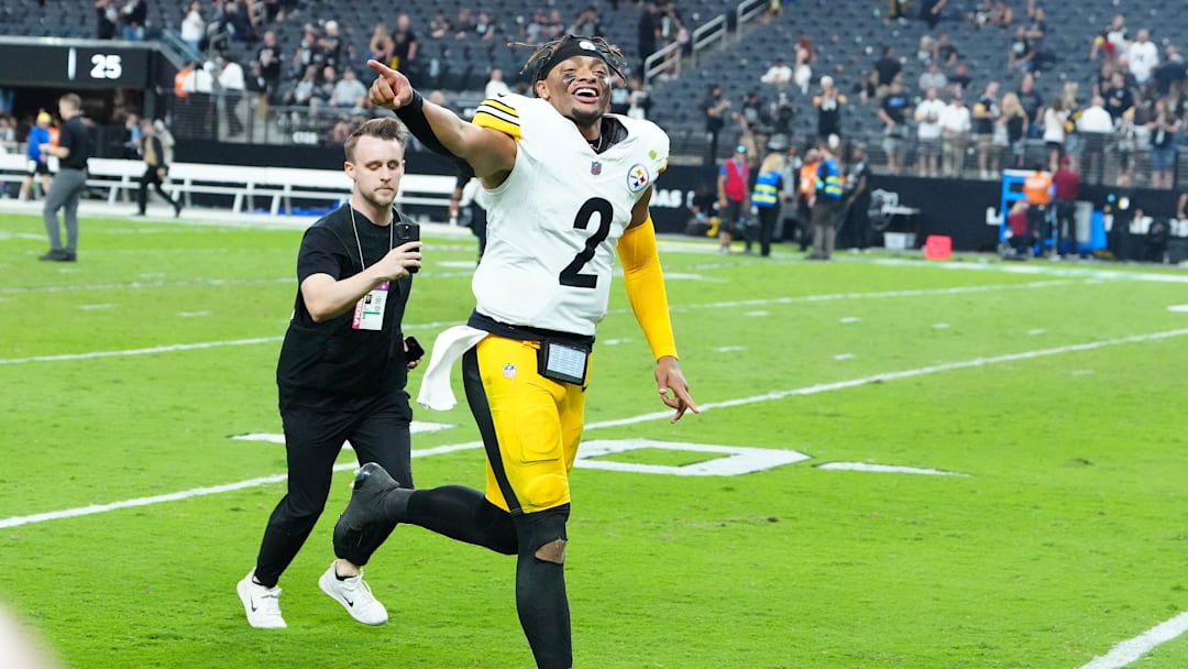 Oct 13, 2024; Paradise, Nevada, USA; Pittsburgh Steelers quarterback Justin Fields (2) runs off the field after the Steelers defeated the Las Vegas Raiders 32-13 at Allegiant Stadium. Mandatory Credit: Stephen R. Sylvanie-Imagn Images