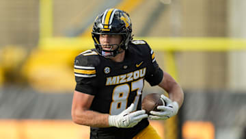 Sep 6, 2025; Columbia, Missouri, USA; Missouri Tigers tight end Brett Norfleet (87) runs with the ball during the second half against the Kansas Jayhawks at Faurot Field at Memorial Stadium. Mandatory Credit: Jay Biggerstaff-Imagn Images