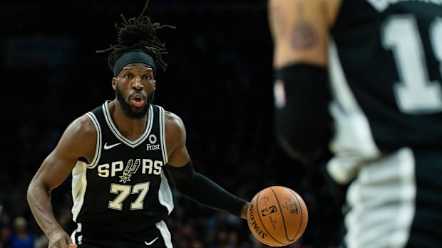 San Antonio Spurs forward DeMarre Carroll (77) dribbles up court against the Philadelphia 76ers during the second quarter
