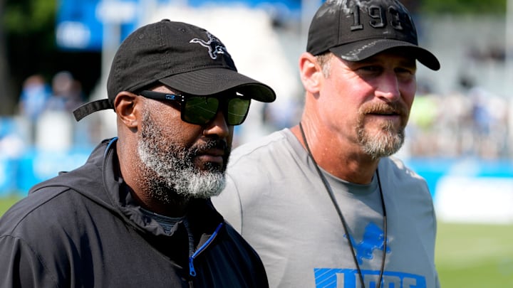 Detroit Lions executive vice president and general manager Brad Holmes, left, and Lions head coach Dan Campbell head off the practice field at the team's training facility in Allen Park on Wednesday, Aug. 14, 2024.