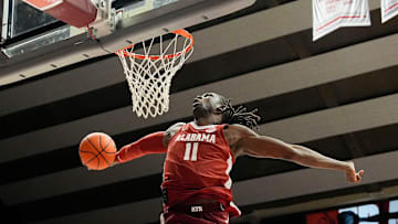The University of Alabama unveiled the first banner honoring the school’s first Final Four appearance Friday, Oct. 11, 2024, in Coleman Coliseum. Alabama center Clifford Omoruyi (11) participates in the dunk contest.