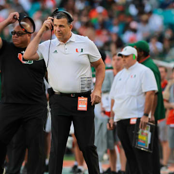 Nov 23, 2024; Miami Gardens, Florida, USA; Miami Hurricanes head coach Mario Cristobal look son from the sideline against the Wake Forest Demon Deacons during the second quarter at Hard Rock Stadium. Mandatory Credit: Sam Navarro-Imagn Images