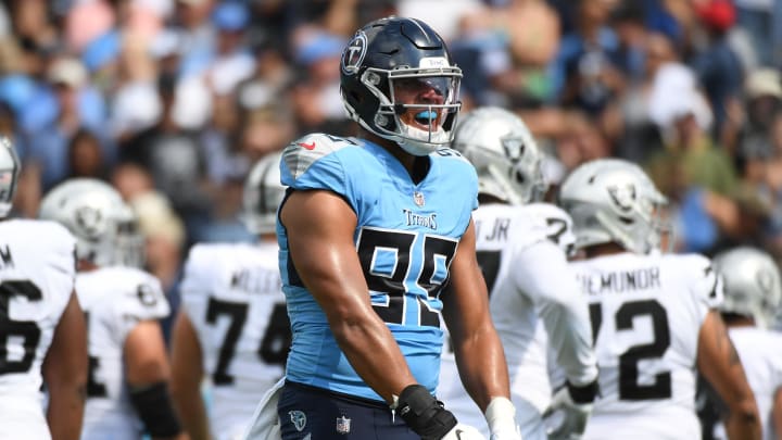 Sep 25, 2022; Nashville, Tennessee, USA; Tennessee Titans linebacker Rashad Weaver (99) celebrates after a sack during the first half against the Las Vegas Raiders at Nissan Stadium. Mandatory Credit: Christopher Hanewinckel-USA TODAY Sports