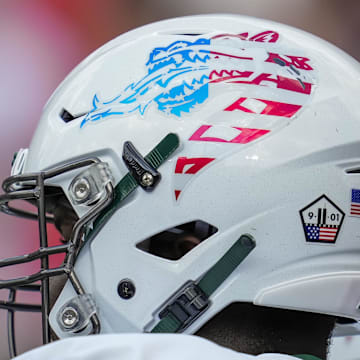 Sep 11, 2021; Athens, Georgia, USA; UAB Blazers offensive lineman Keshawn Moore (63) wearing a helmet honoring the memory of the lives lost on September 11, 2001 on the field against the Georgia Bulldogs at Sanford Stadium. Mandatory Credit: Dale Zanine-Imagn Images