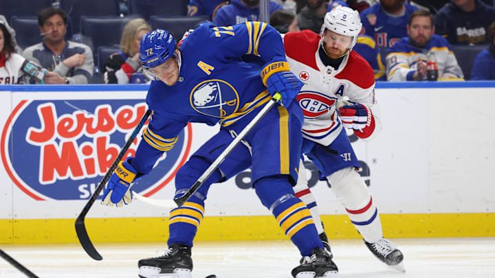 May 8, 2026; Buffalo, New York, USA; Buffalo Sabres center Tage Thompson (72) looks to control the puck as Montréal Canadiens defenseman Mike Matheson (8) defends during the second period in game two of the second round of the 2026 Stanley Cup Playoffs at KeyBank Center. Mandatory Credit: Timothy T. Ludwig-Imagn Images