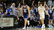 Jan 21, 2025; Boulder, Colorado, USA; Brigham Young Cougars guard Trevin Knell (21) reacts to a three point basket in the second half against the Colorado Buffaloes at CU Events Center. Mandatory Credit: Ron Chenoy-Imagn Images