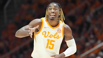 Tennessee's Jahmai Mashack (15) signals to teammates during a men’s college basketball game between Tennessee and Alabama at Thompson-Boling Arena