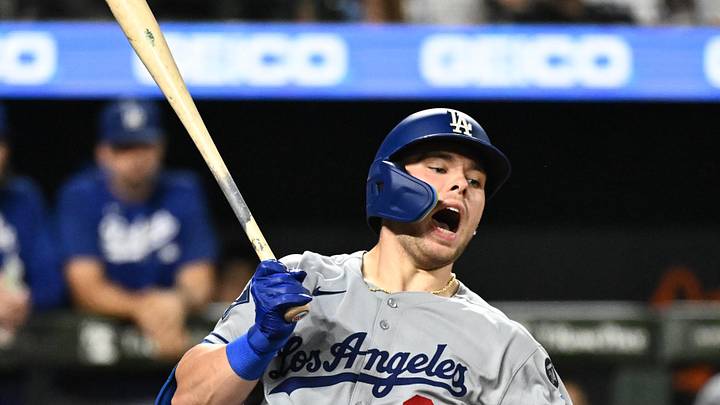 Sep 5, 2025; Baltimore, Maryland, USA;  Los Angeles Dodgers catcher Dalton Rushing (68) reacts to a foul ball off his leg during the sixth inning against the Baltimore Orioles at Oriole Park at Camden Yards. Mandatory Credit: James A. Pittman-Imagn Images