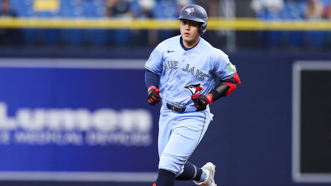 Toronto Blue Jays third baseman Kazuma Okamoto runs the bases.