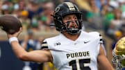 Purdue Boilermakers quarterback Ryan Browne (15) throws a pass 
