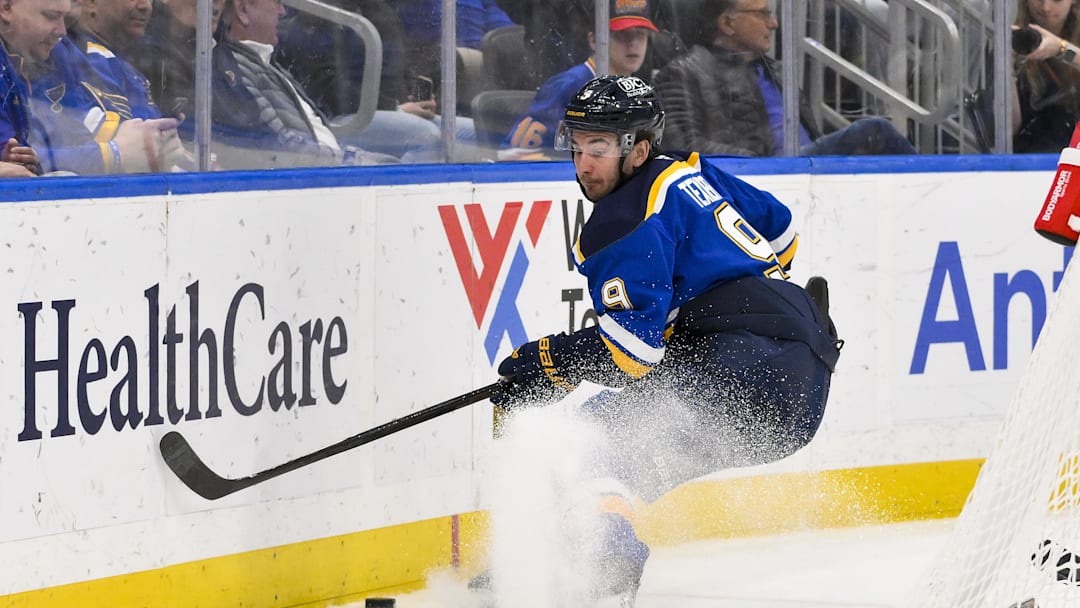 Mar 23, 2025; St. Louis, Missouri, USA;  St. Louis Blues center Alexandre Texier (9) controls the puck against the Nashville Predators during the second period at Enterprise Center. Mandatory Credit: Jeff Curry-Imagn Images