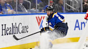 Mar 23, 2025; St. Louis, Missouri, USA;  St. Louis Blues center Alexandre Texier (9) controls the puck against the Nashville Predators during the second period at Enterprise Center. Mandatory Credit: Jeff Curry-Imagn Images