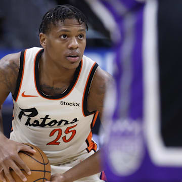 Apr 7, 2025; Detroit, Michigan, USA;  Detroit Pistons guard Marcus Sasser (25) dribbles in the second half against the Sacramento Kings at Little Caesars Arena. Mandatory Credit: Rick Osentoski-Imagn Images