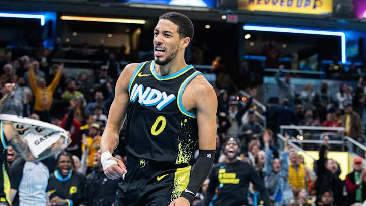 Nov 24, 2023; Indianapolis, Indiana, USA; Indiana Pacers guard Tyrese Haliburton (0) celebrates a made basket  in the second half against the Detroit Pistons at Gainbridge Fieldhouse. Mandatory Credit: Trevor Ruszkowski-Imagn Images