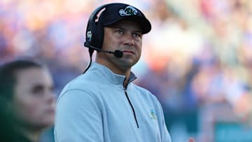 Dec 20, 2024; Tampa, FL, USA; Tulane Green Wave head coach Jon Sumrall looks on against the Florida Gators during the first quarter at Raymond James Stadium