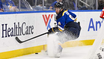 Mar 23, 2025; St. Louis, Missouri, USA;  St. Louis Blues center Alexandre Texier (9) controls the puck against the Nashville Predators during the second period at Enterprise Center. Mandatory Credit: Jeff Curry-Imagn Images