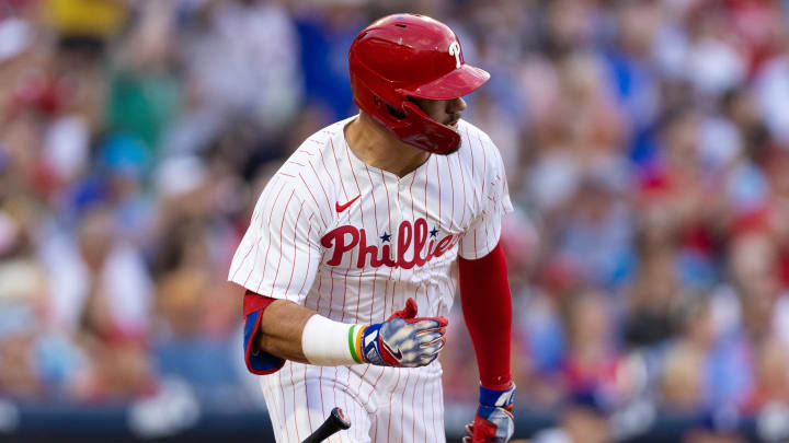 Jul 9, 2024; Philadelphia, Pennsylvania, USA; Philadelphia Phillies designated hitter Kyle Schwarber (12) hits a 2 RBI single during the second inning against the Los Angeles Dodgers at Citizens Bank Park.