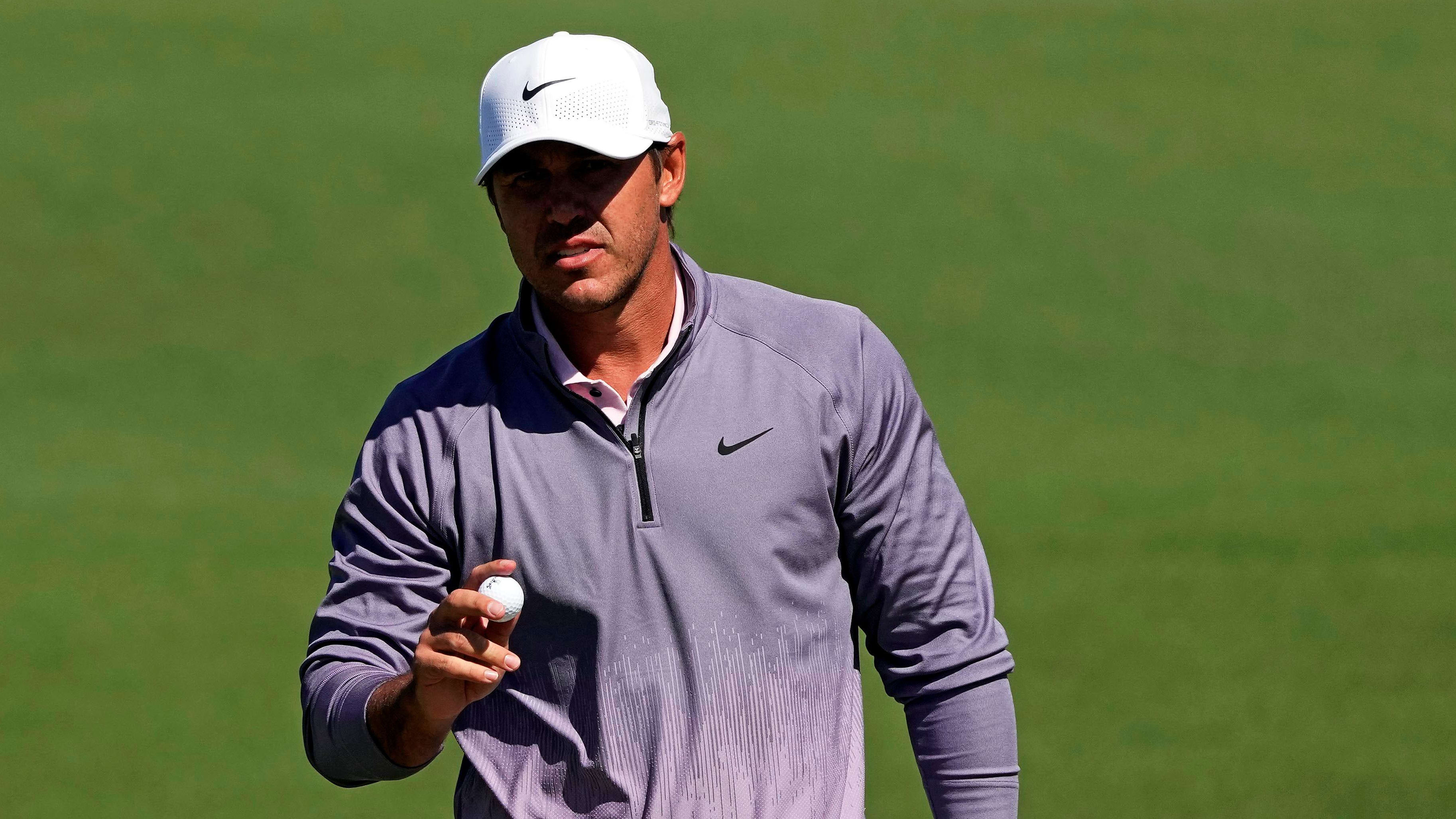 Brooks Koepka reacts to a putt during the 2024 Masters.