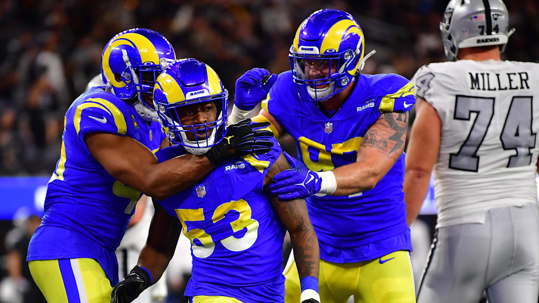 Dec 8, 2022; Inglewood, California, USA; Los Angeles Rams linebacker Ernest Jones (53) celebrates after intercepting a pass intended for Las Vegas Raiders wide receiver Davante Adams (17) during the first half at SoFi Stadium. Mandatory Credit: Gary A. Vasquez-Imagn Images