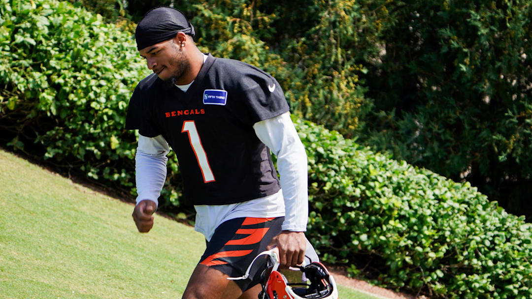 Cincinnati Bengals wide receiver Ja'Marr Chase (1) walks onto the practice field, Wednesday, Sept. 4, 2024, in Cincinnati.