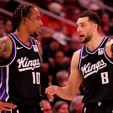 Mar 1, 2025; Houston, Texas, USA; Sacramento Kings forward DeMar DeRozan (10) talks with guard Zach LaVine (8) during a timeout against the Houston Rockets during the third quarter at Toyota Center. Mandatory Credit: Erik Williams-Imagn Images