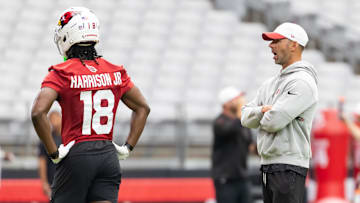 Jul 24, 2025; Glendale, AZ, USA; Arizona Cardinals head coach Jonathan Gannon (right) with wide receiver Marvin Harrison Jr. (18) during training camp at State Farm Stadium. Mandatory Credit: Mark J. Rebilas-Imagn Images