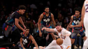 Jan 31, 2024; Brooklyn, New York, USA; Phoenix Suns center Jusuf Nurkic (20) fights for a loose ball