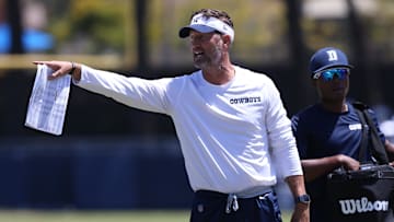 Jul 30, 2024; Oxnard, CA, USA; Dallas Cowboys offensive coordinator Brian Schottenheimer during training camp at the River Ridge Playing Fields in Oxnard, California. Mandatory Credit: Jason Parkhurst-Imagn Images