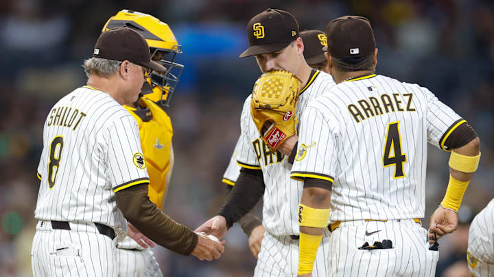 Jul 29, 2025; San Diego, California, USA; San Diego Padres manager Mike Shildt (8) makes a pitching change during the fifth inning against the New York Mets at Petco Park. Mandatory Credit: David Frerker-Imagn Images