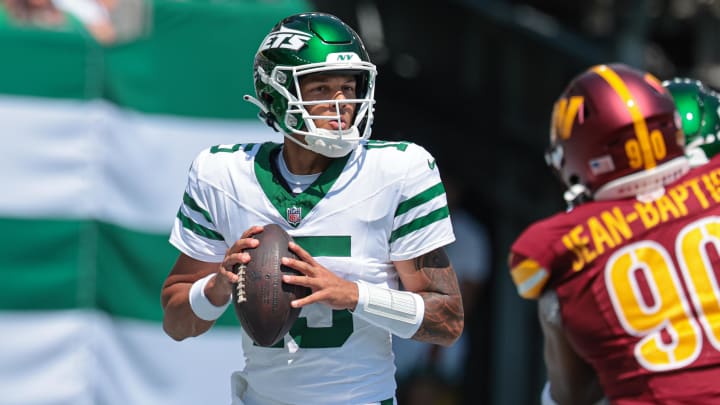 Aug 10, 2024; East Rutherford, New Jersey, USA; New York Jets quarterback Adrian Martinez drops back to pass against the Washington Commanders at MetLife Stadium.